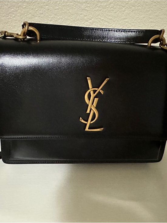 Saint Laurent Handbags - Saint Laurent Black Leather Fold-Over Clutch with Gold Stamp